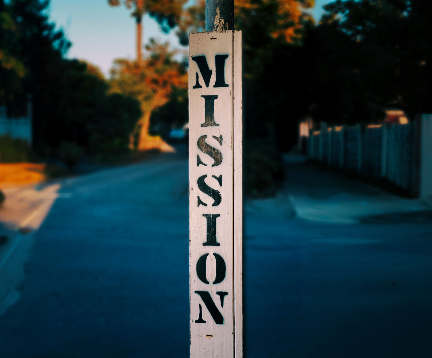 A vertical post with the word “MISSION” stencilled on it.
